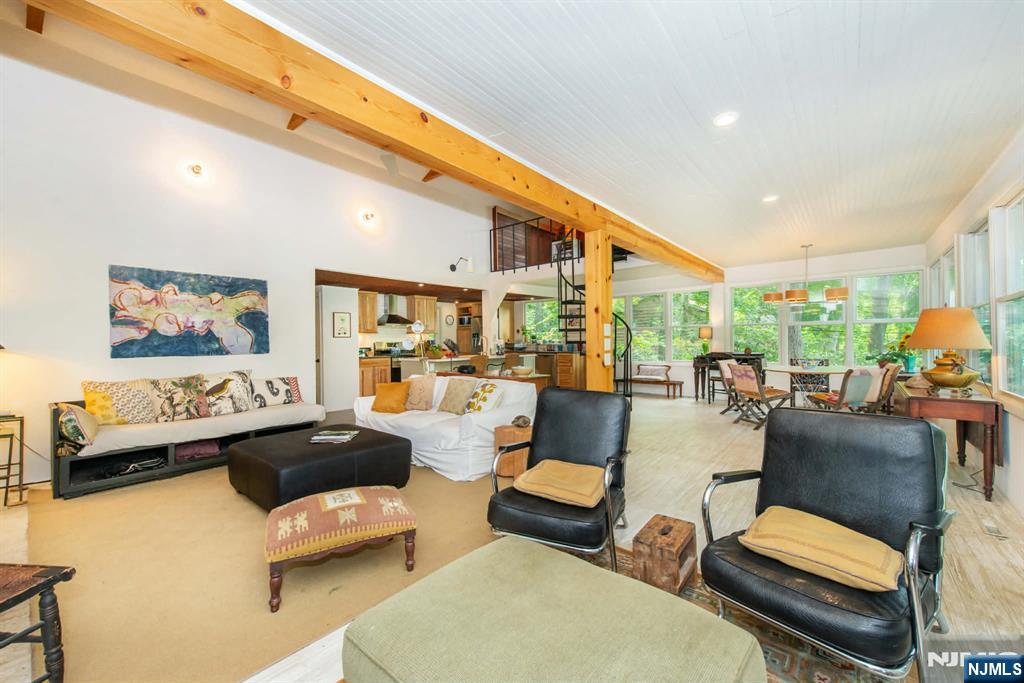 37 N Road Bloomingdale, NJ 07420 - Photo 11 of 18 a living room with furniture and a large window