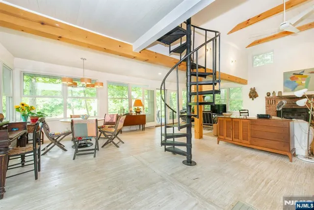 a view of a patio with a table and chairs
