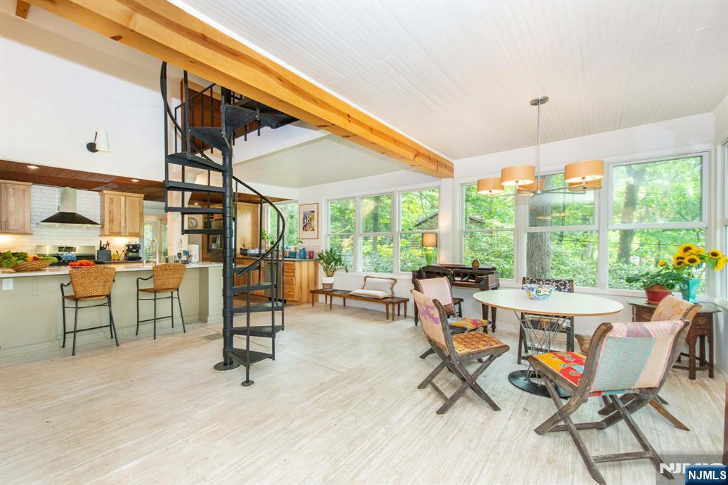 37 N Road Bloomingdale, NJ 07420 - Photo 3 of 18 a view of a dining room with furniture window and outside view