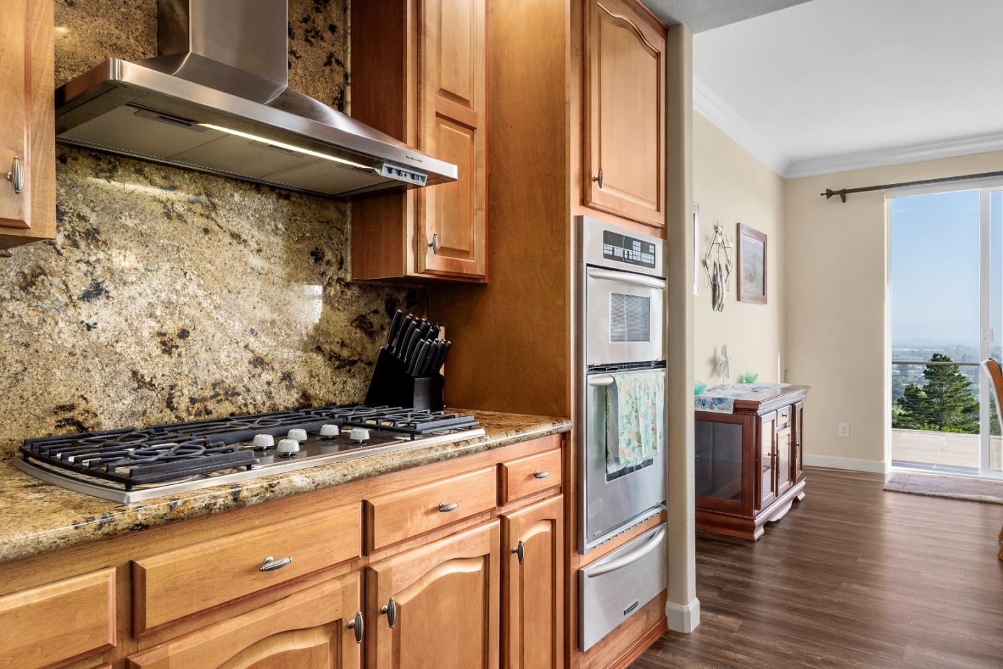 960 Smith Road Watsonville, CA 95076 - Photo 12 of 68 a kitchen with stainless steel appliances granite countertop a stove and a refrigerator