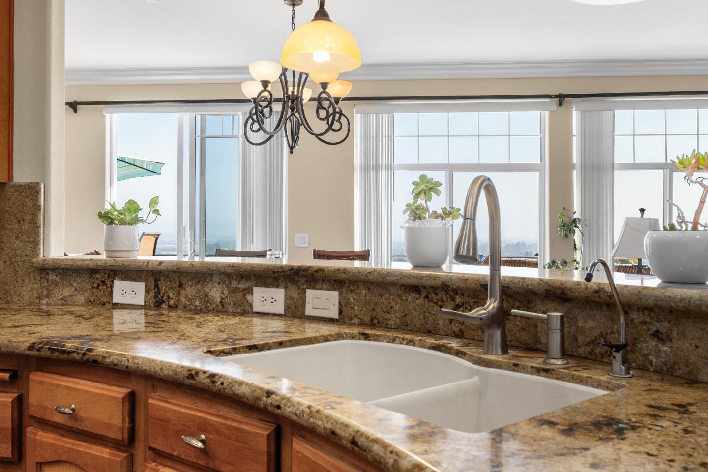 960 Smith Road Watsonville, CA 95076 - Photo 13 of 68 a bathroom with a granite countertop sink and a large mirror