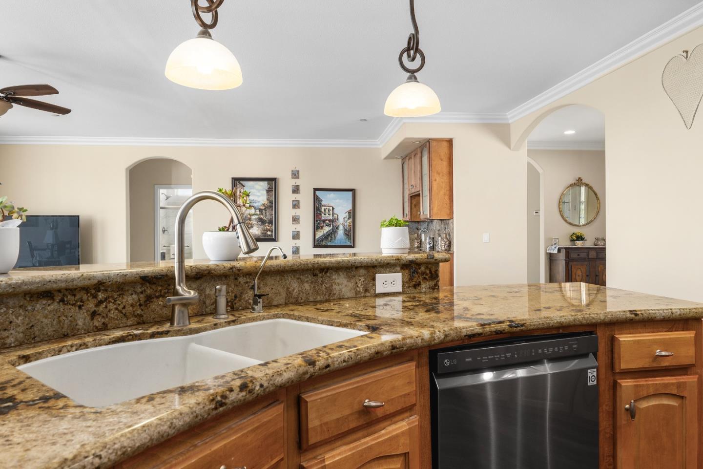 960 Smith Road Watsonville, CA 95076 - Photo 14 of 68 a kitchen with granite countertop a sink and a stove