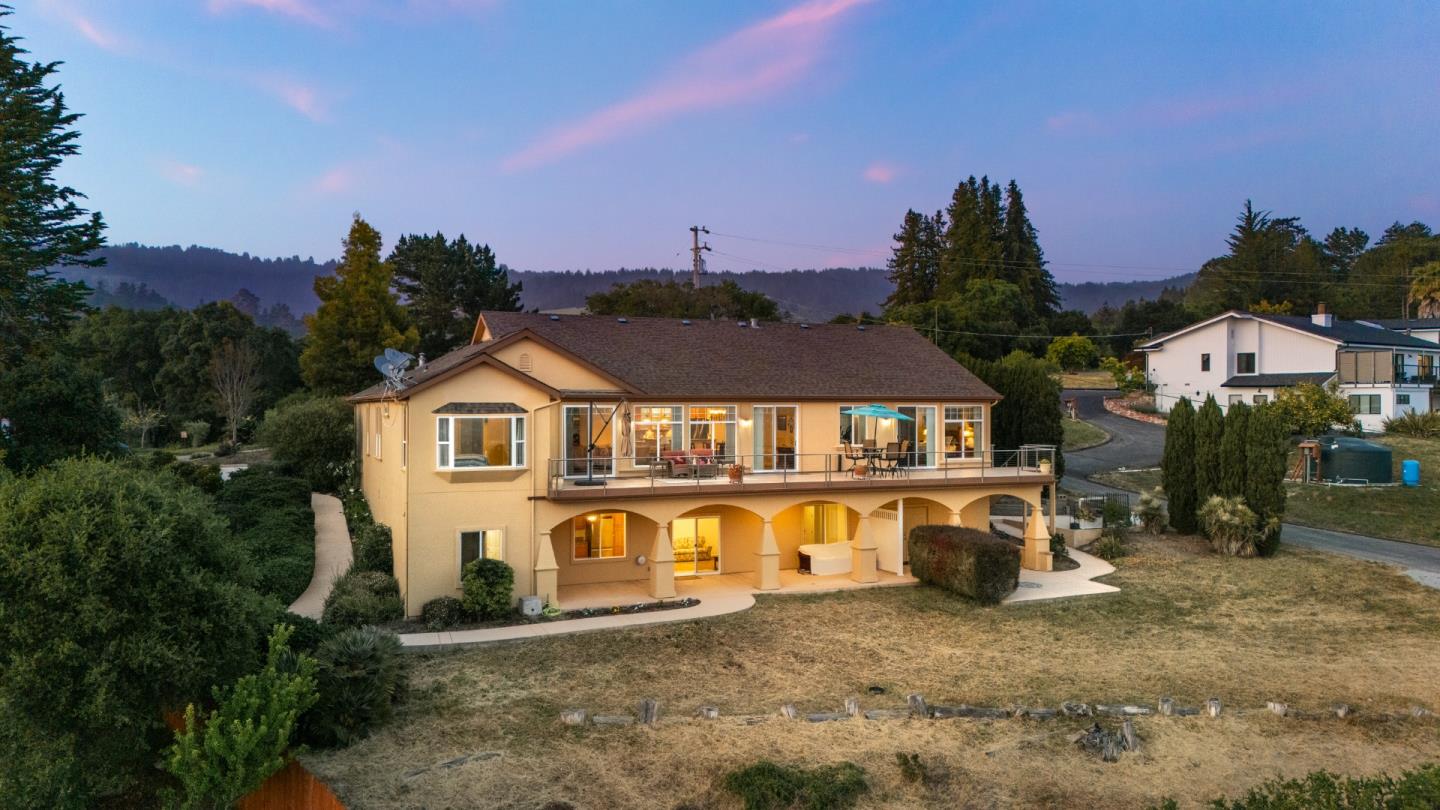 960 Smith Road Watsonville, CA 95076 - Photo 2 of 68 a front view of a house with a yard and garage