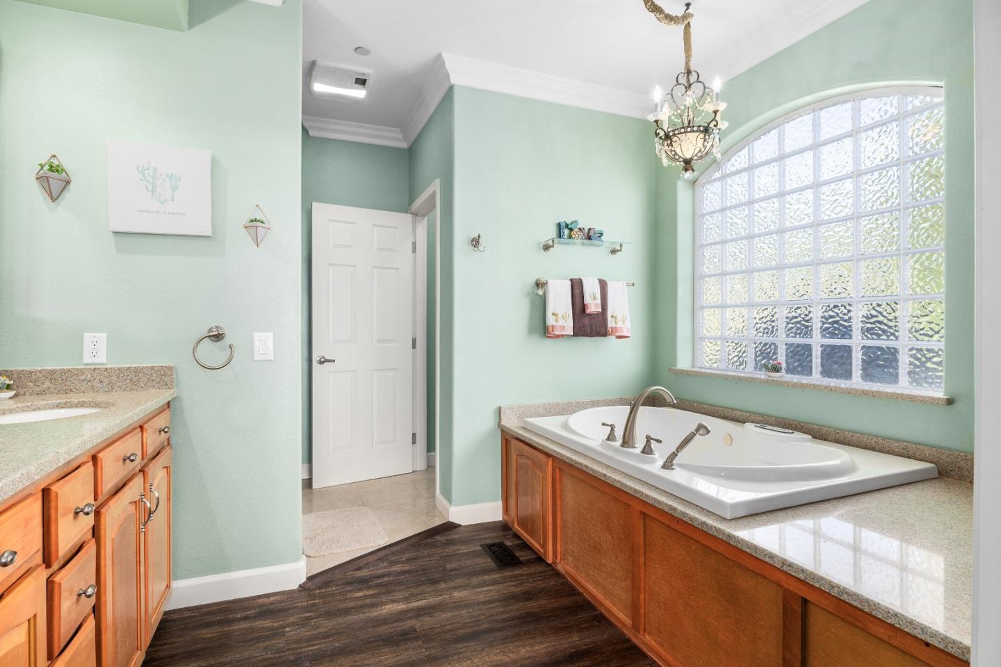 960 Smith Road Watsonville, CA 95076 - Photo 25 of 68 a spacious bathroom with a tub sink and mirror