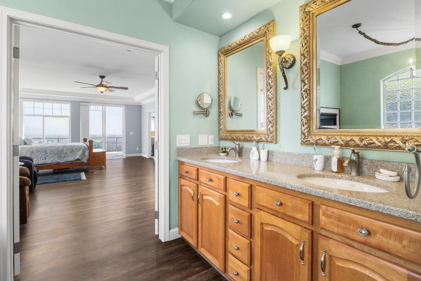 960 Smith Road Watsonville, CA 95076 - Photo 26 of 68 a spacious en suite bathroom with sink and mirror