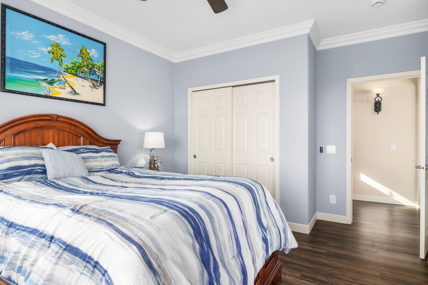 960 Smith Road Watsonville, CA 95076 - Photo 33 of 68 a bedroom with a bed and a painting on the wall