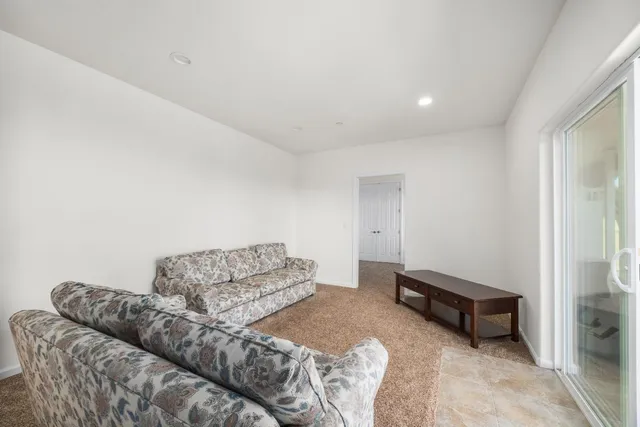 a front view of a house with a garage