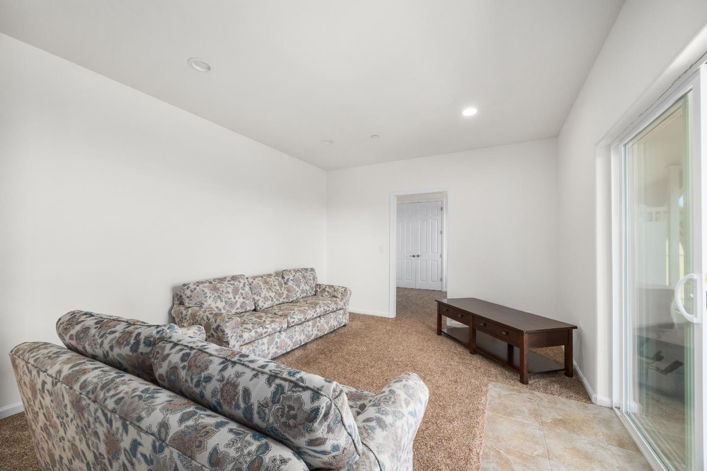 960 Smith Road Watsonville, CA 95076 - Photo 45 of 68 a bedroom with a bed and a couch