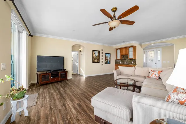 a kitchen with stainless steel appliances granite countertop a stove and a refrigerator