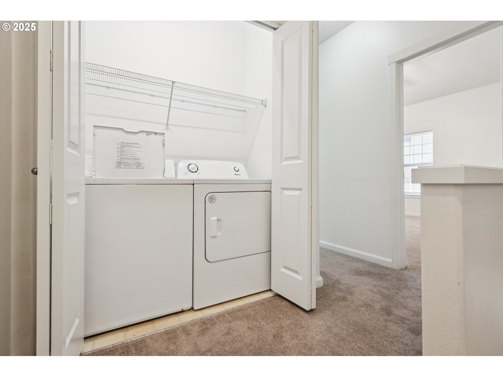 1000 Southwest 170th Avenue, Unit 201 Beaverton, OR 97003 - Photo 11 of 14 a utility room with cabinets washer and dryer