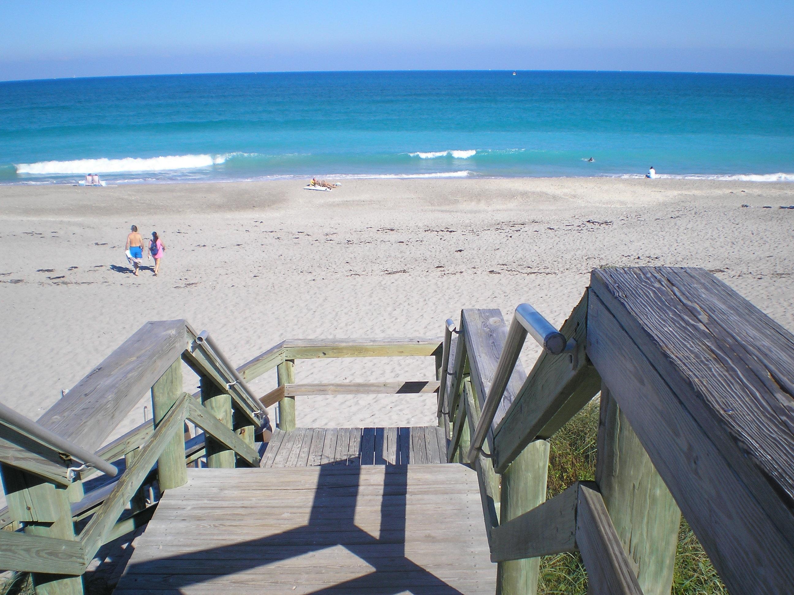3105 31st Court, Unit 130D Jupiter, FL 33477 - Photo 21 of 24 a view of beach and ocean