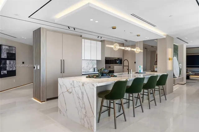 a living room with furniture large window and flat screen tv