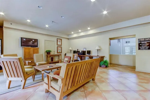 a view of a balcony with chairs