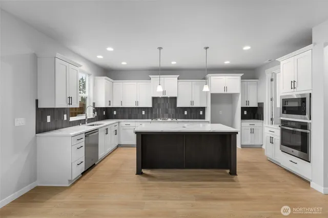 $910,235 | 20328 146th St Court East, Unit 704, Bonney Lake, WA 98391