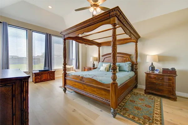 a bedroom with furniture and window