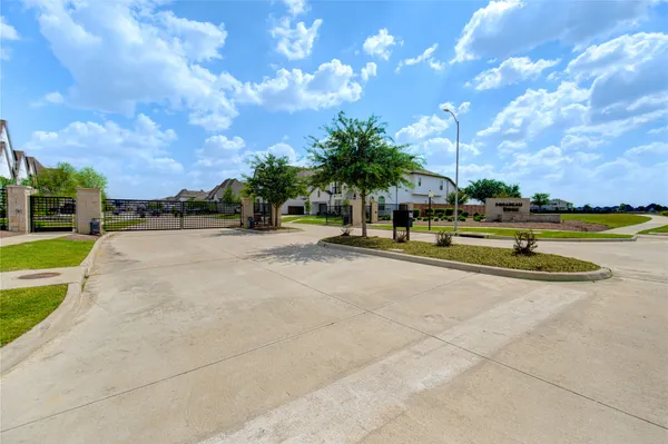 a view of a playground with basketball court