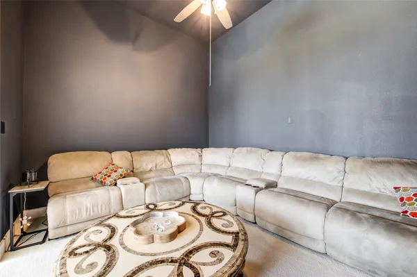 a view of swimming pool with outdoor seating and yard