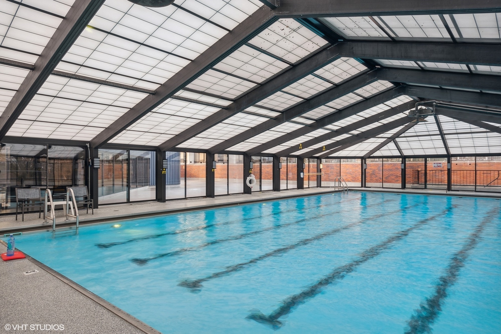 5415 North Sheridan Road, Unit 2103 Chicago, IL 60640 - Photo 11 of 12 a view of an indoor swimming pool