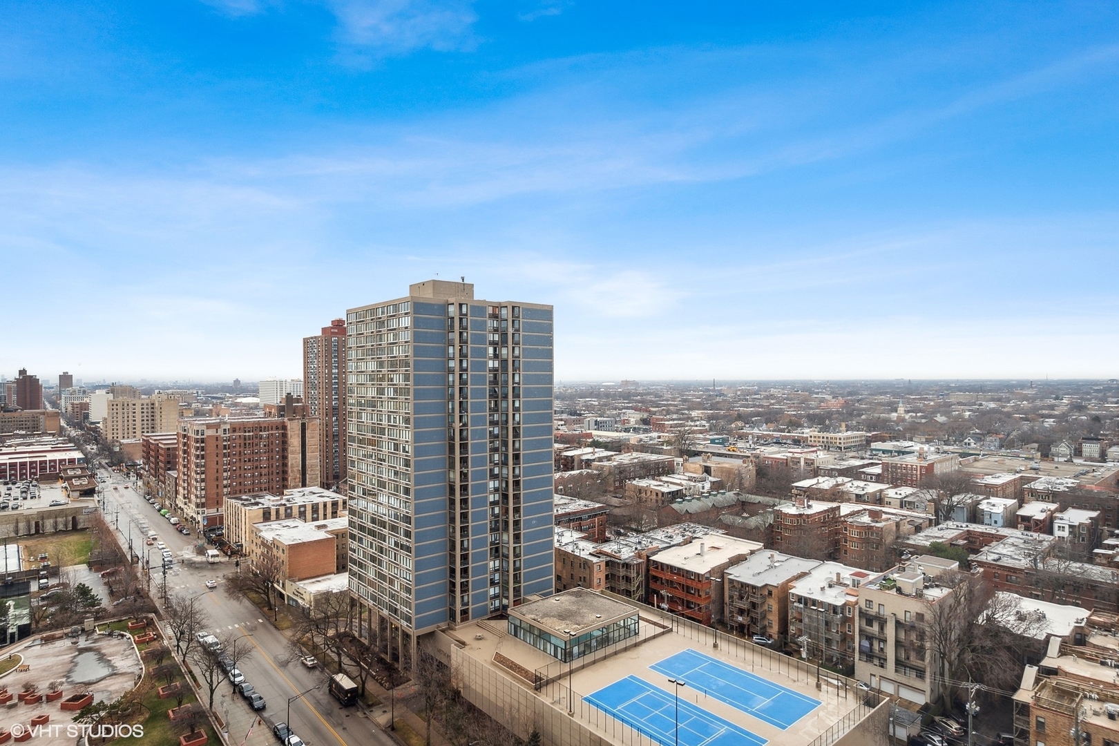 5415 North Sheridan Road, Unit 2103 Chicago, IL 60640 - Photo 10 of 12 an aerial view of city and lake