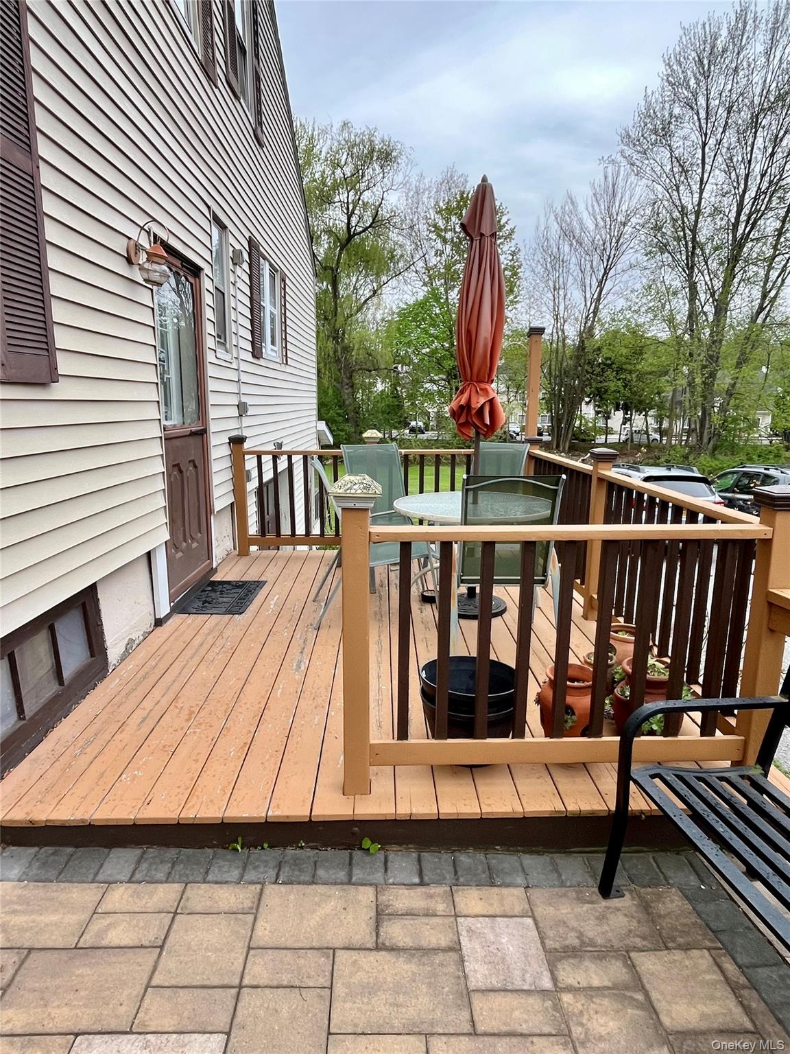 35 Spring Street Goshen, NY 10924 - Photo 25 of 26 a view of a roof deck with wooden floor and fence
