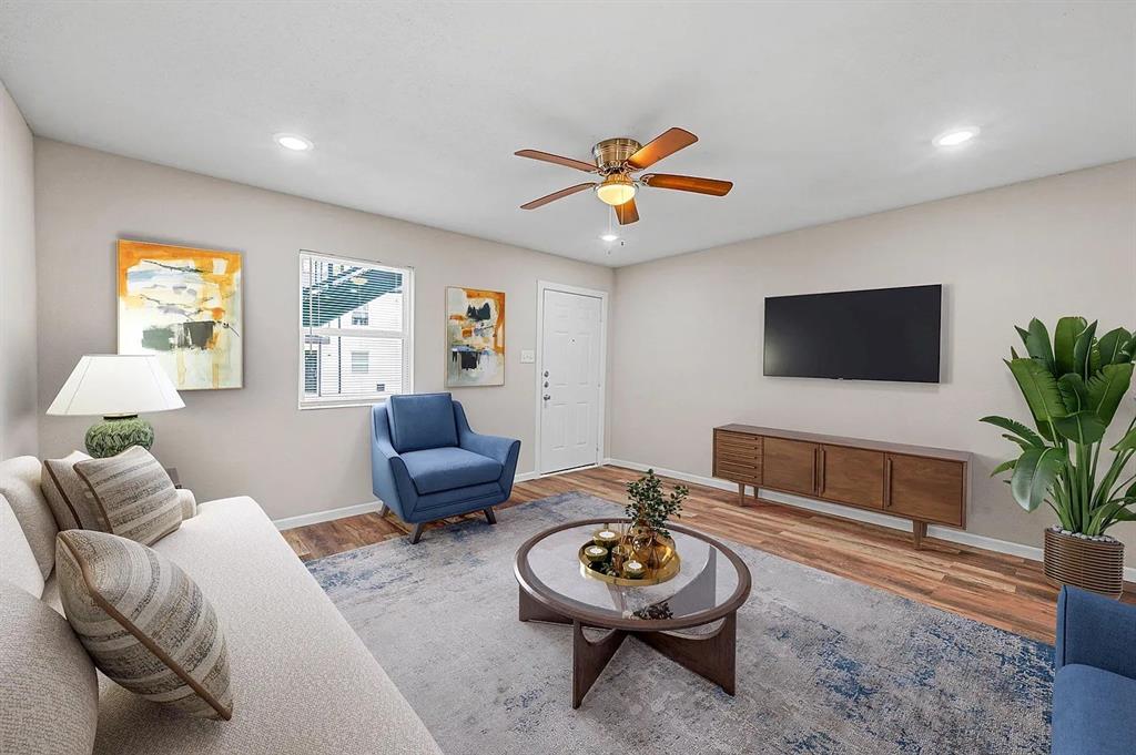 500 Highway 75, Unit 9 Van Alstyne, TX 75495 - Photo 10 of 13 Living area featuring wood-finish flooring, recessed lighting, and a ceiling fan