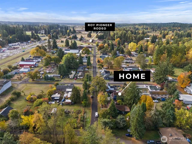 a picture of a bench in front of a wall