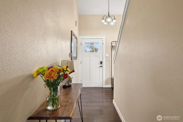 a vase of flowers sitting on a table