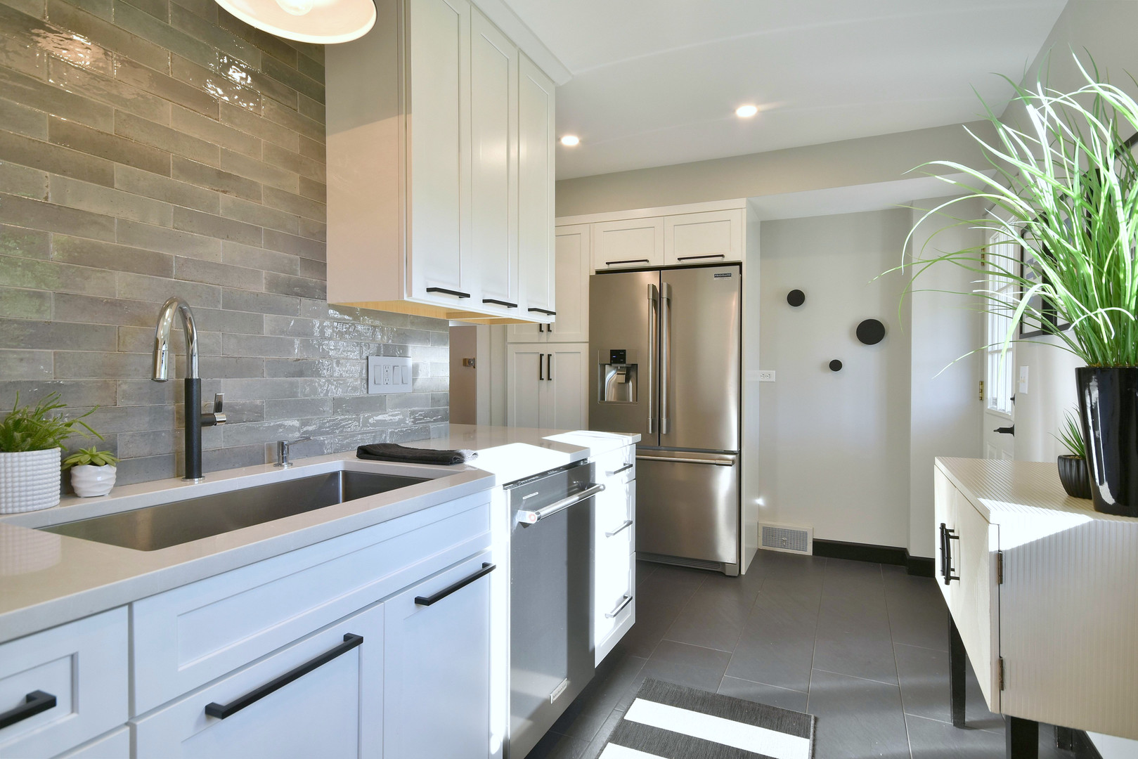 709 Spring Road Elmhurst, IL 60126 - Photo 15 of 42 a kitchen with a refrigerator and a sink