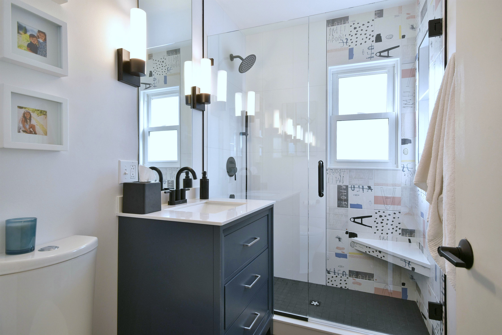 709 Spring Road Elmhurst, IL 60126 - Photo 16 of 42 a bathroom with a sink a toilet and a mirror