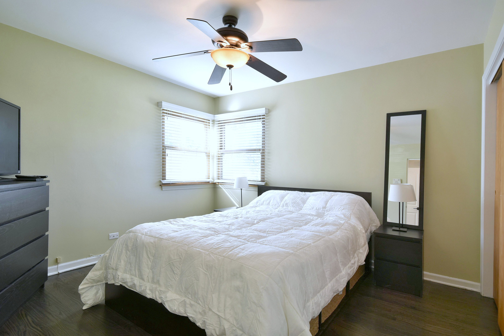 709 Spring Road Elmhurst, IL 60126 - Photo 18 of 42 a bedroom with a bed and a window