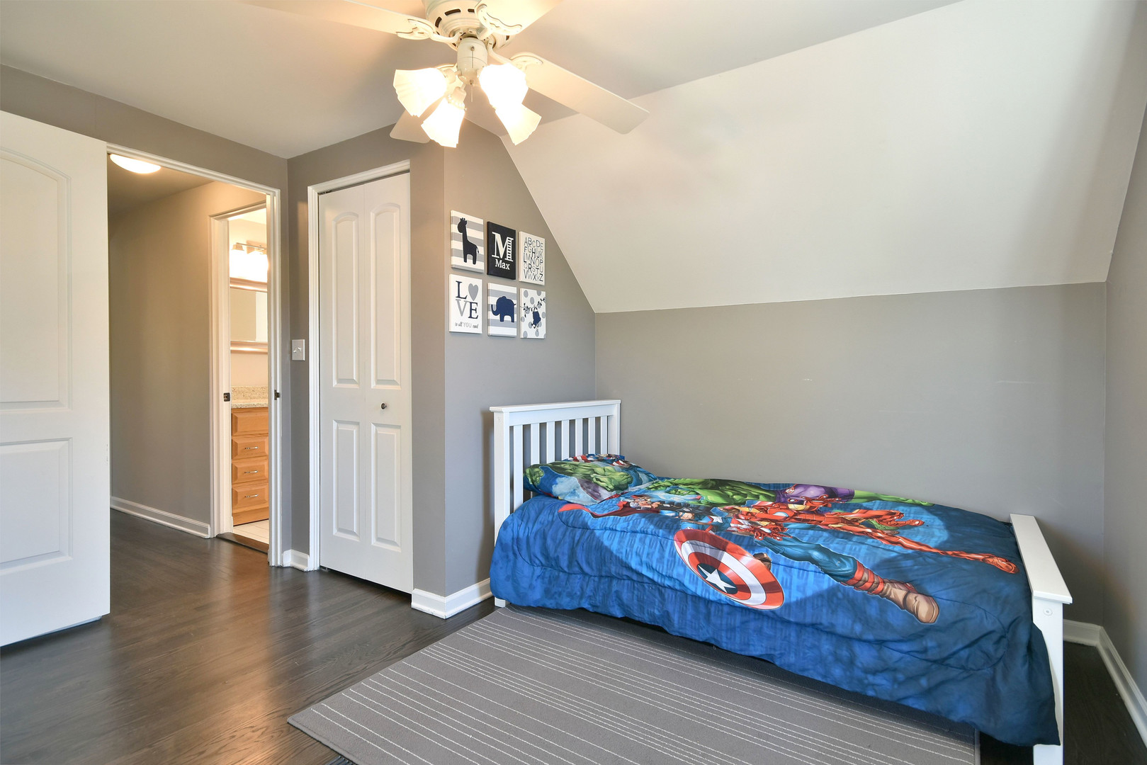 709 Spring Road Elmhurst, IL 60126 - Photo 19 of 42 a bedroom with bed and wooden floor