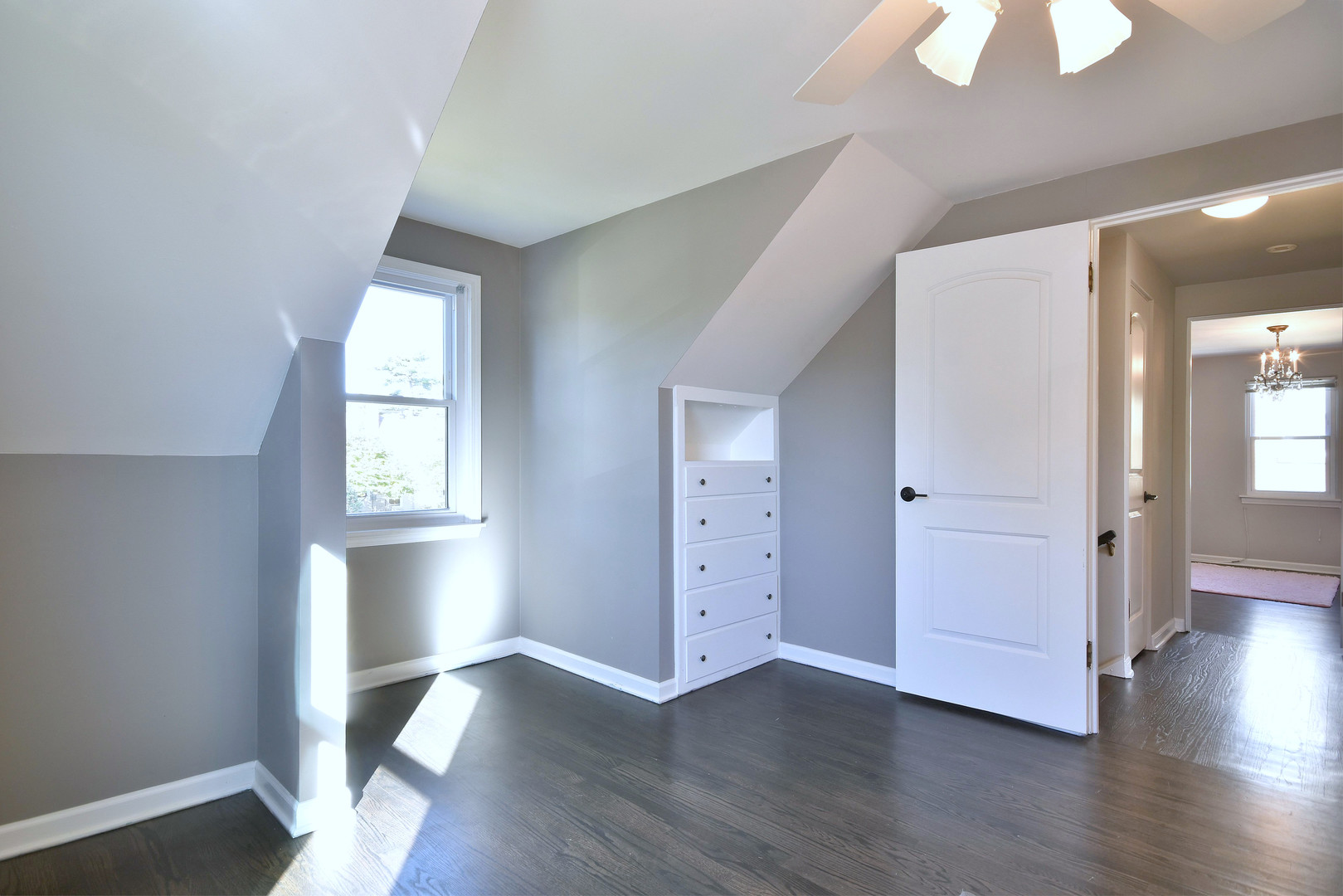 709 Spring Road Elmhurst, IL 60126 - Photo 20 of 42 an empty room with wooden floor and windows