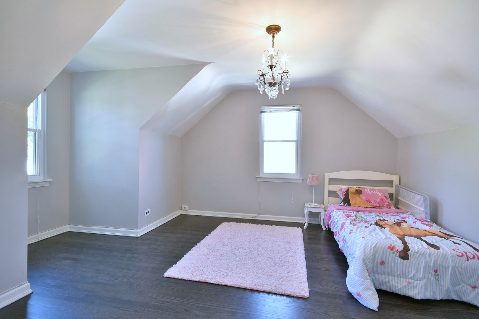709 Spring Road Elmhurst, IL 60126 - Photo 25 of 42 a room with furniture and a window