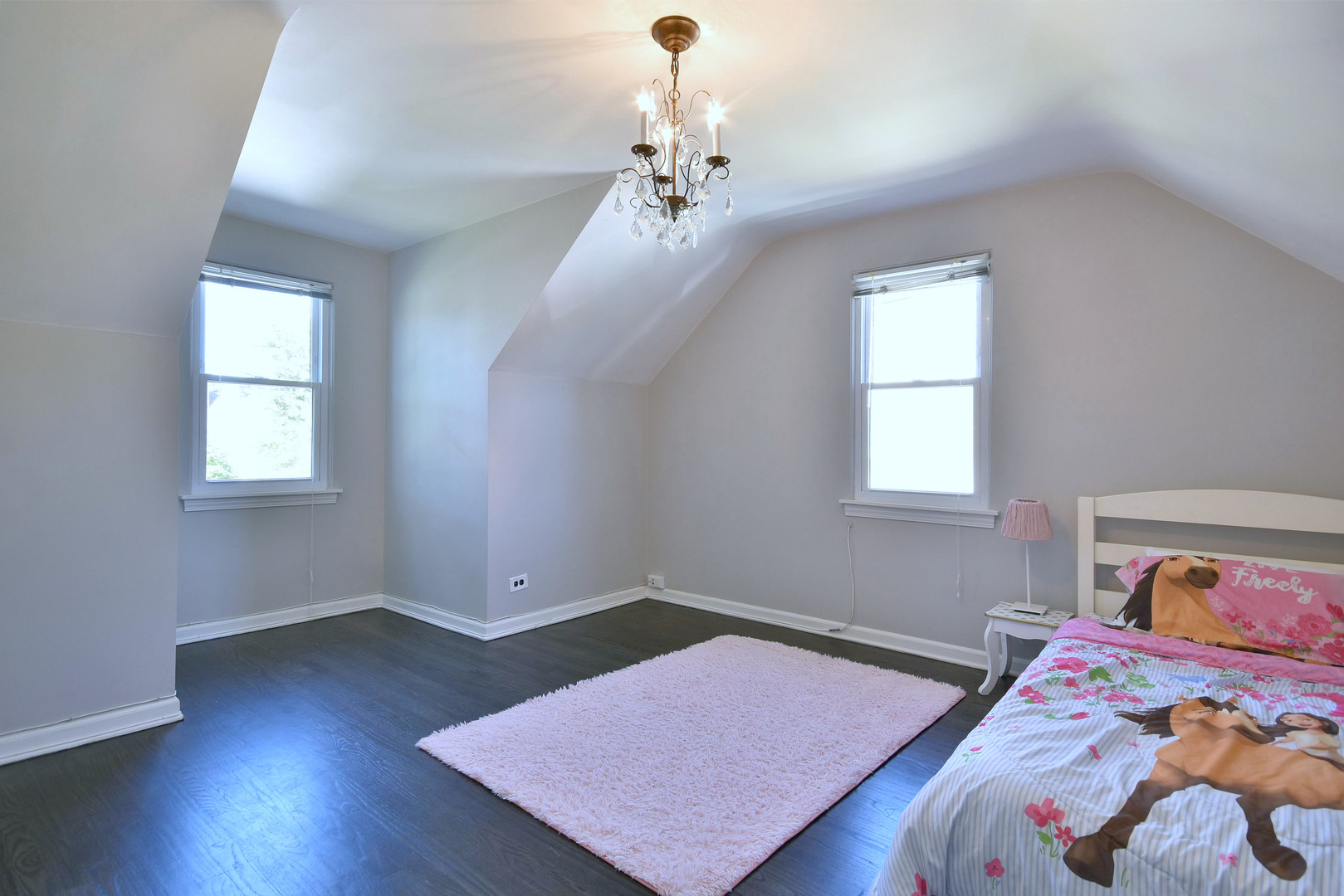 709 Spring Road Elmhurst, IL 60126 - Photo 26 of 42 a bedroom with a bed and wooden floor