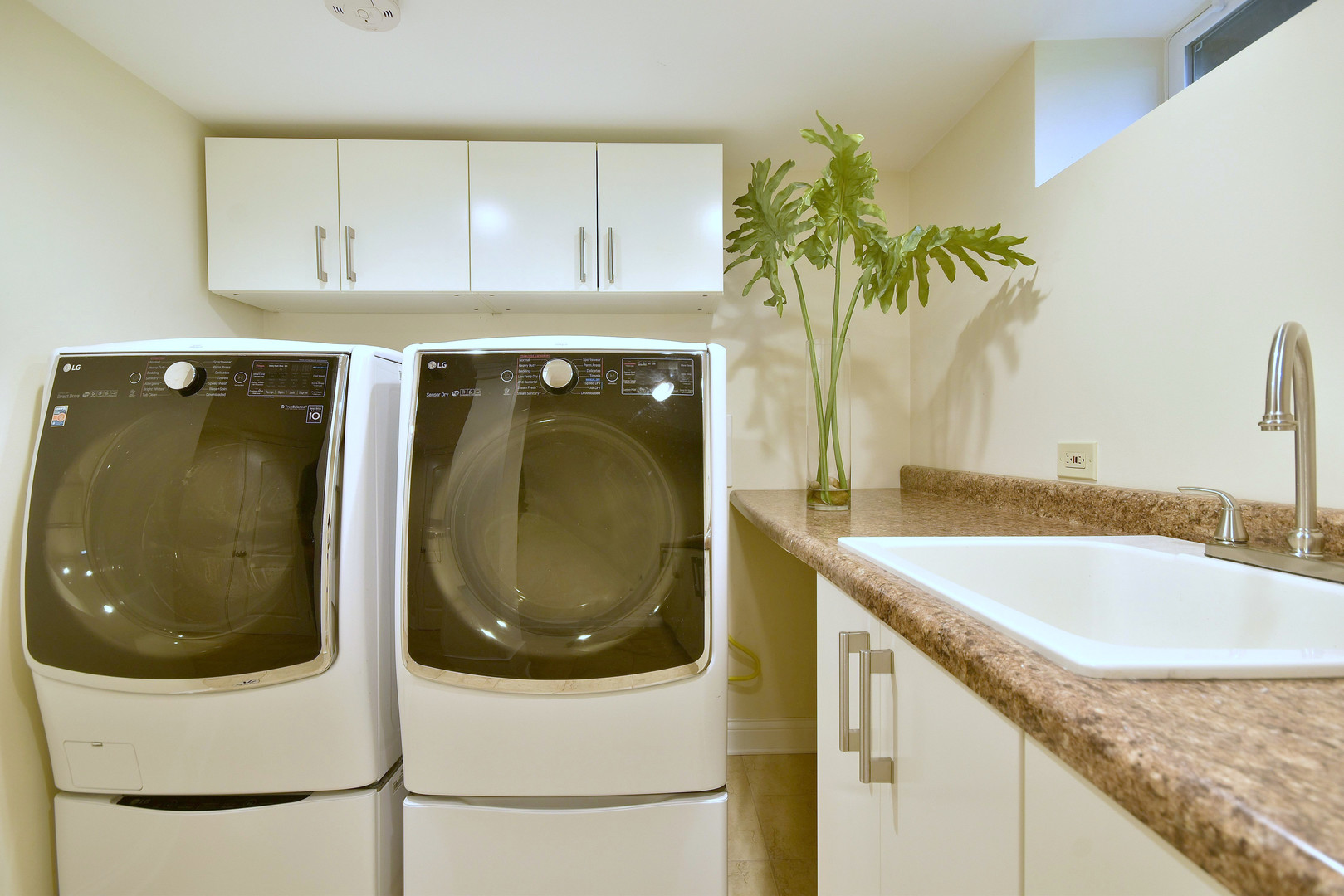 709 Spring Road Elmhurst, IL 60126 - Photo 27 of 42 a kitchen with a sink and cabinets