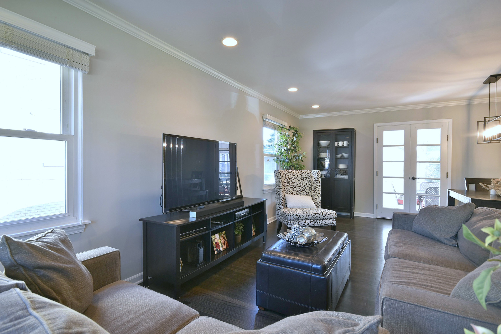 709 Spring Road Elmhurst, IL 60126 - Photo 3 of 42 a living room with furniture and a flat screen tv