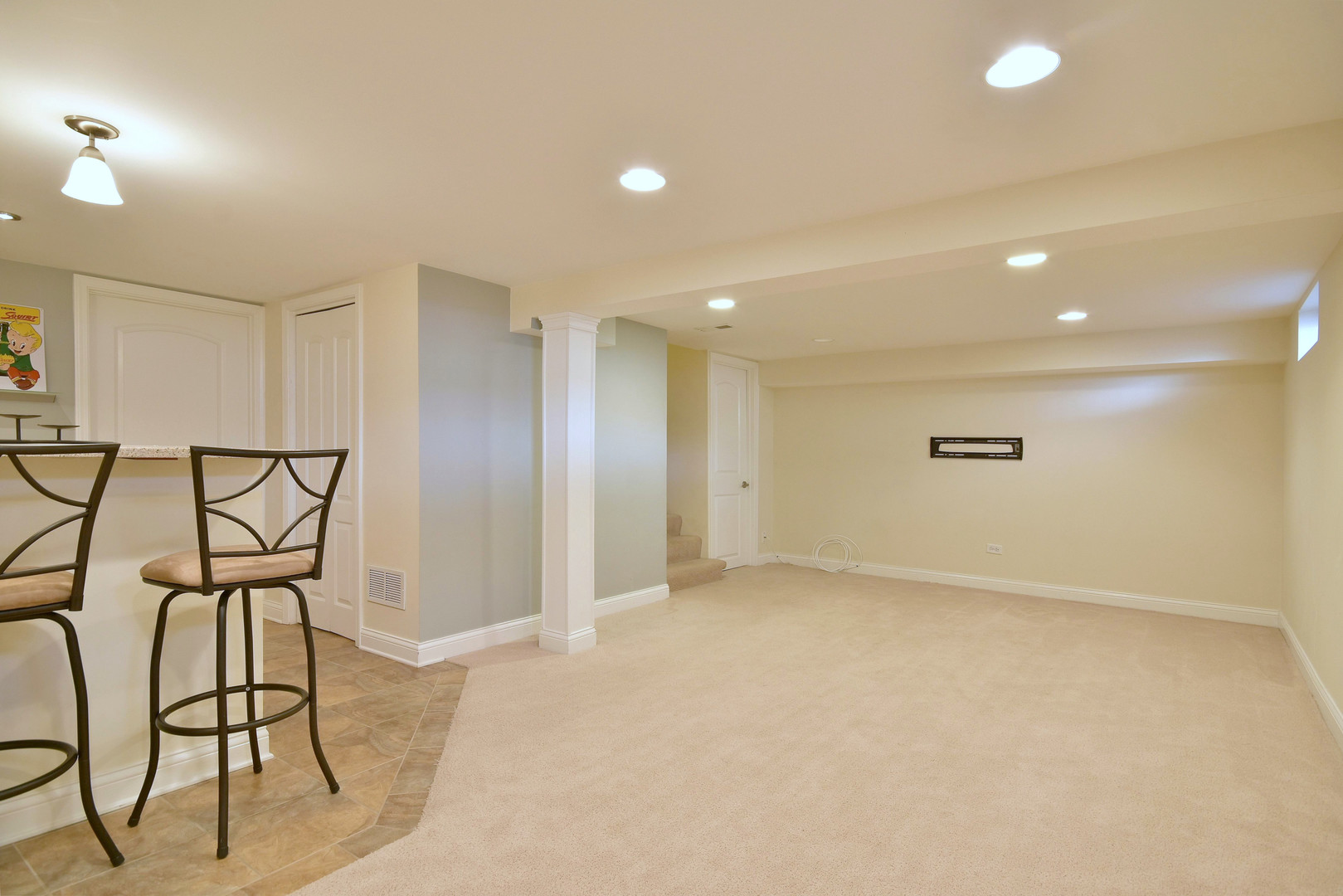 709 Spring Road Elmhurst, IL 60126 - Photo 31 of 42 an empty room with wooden floor and windows