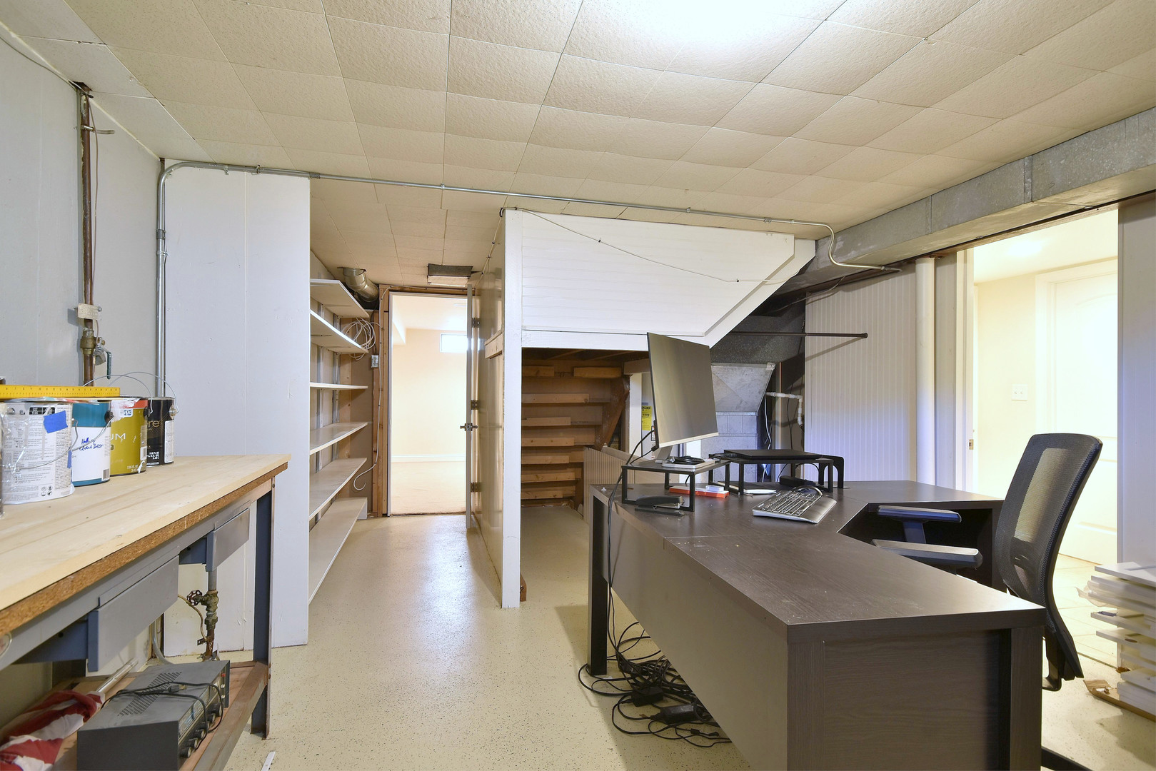 709 Spring Road Elmhurst, IL 60126 - Photo 33 of 42 a dining hall with stainless steel appliances granite countertop a sink dishwasher and a refrigerator with wooden floor