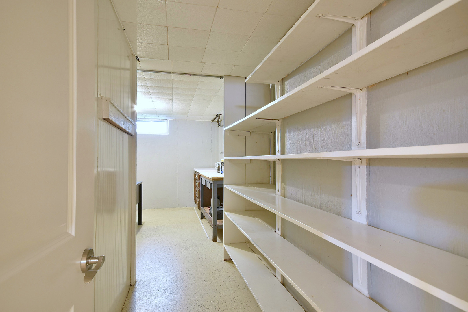 709 Spring Road Elmhurst, IL 60126 - Photo 35 of 42 a view of walk in closet with empty racks