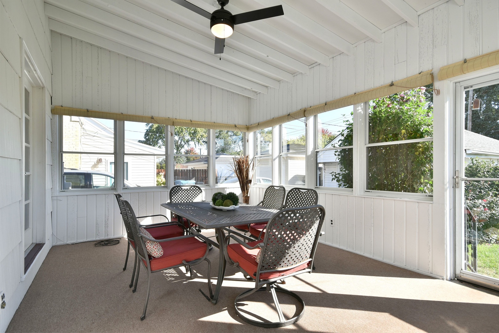 709 Spring Road Elmhurst, IL 60126 - Photo 36 of 42 a dining room with furniture a chandelier and wooden floor