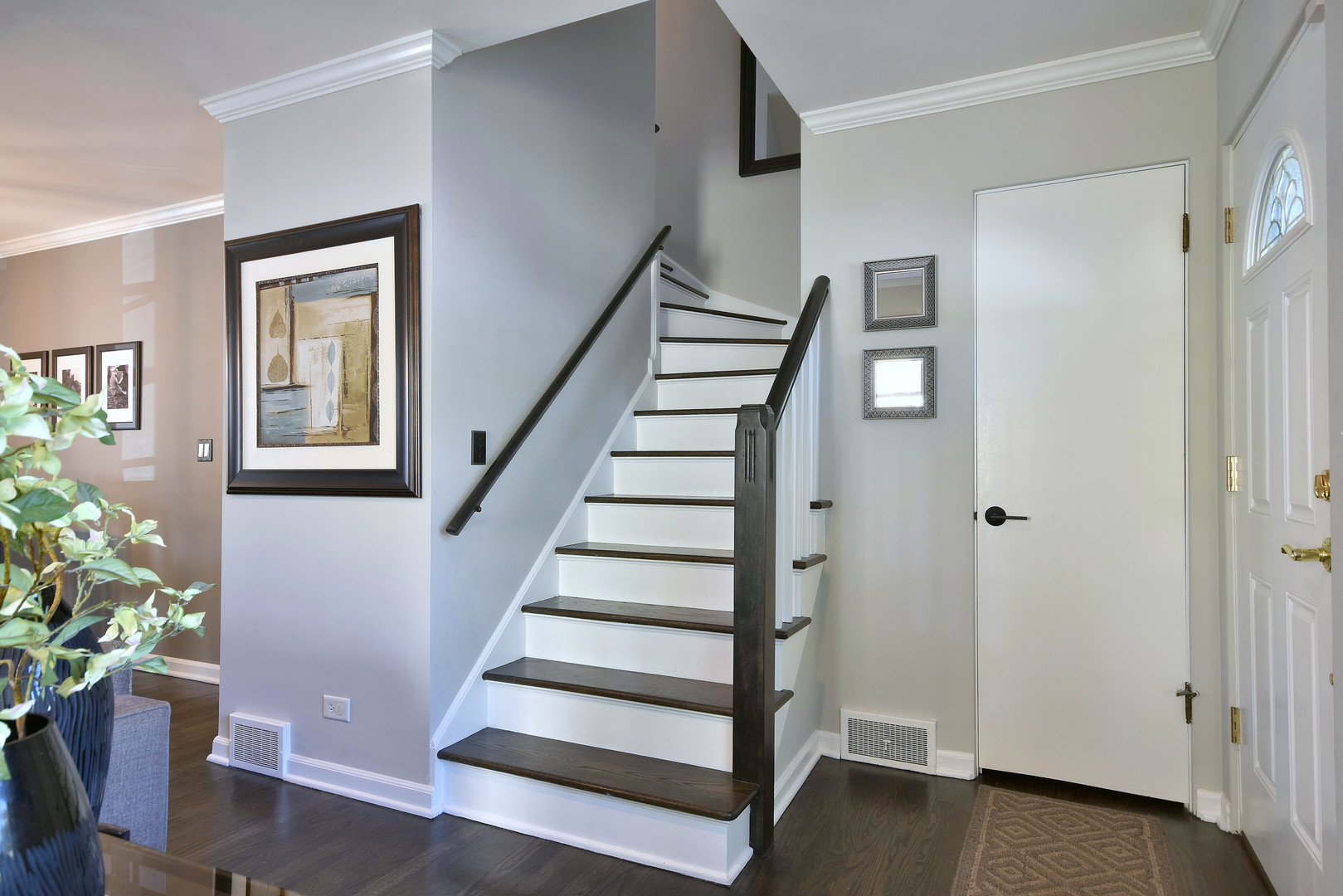 709 Spring Road Elmhurst, IL 60126 - Photo 6 of 42 a view of entryway with wooden floor and front door