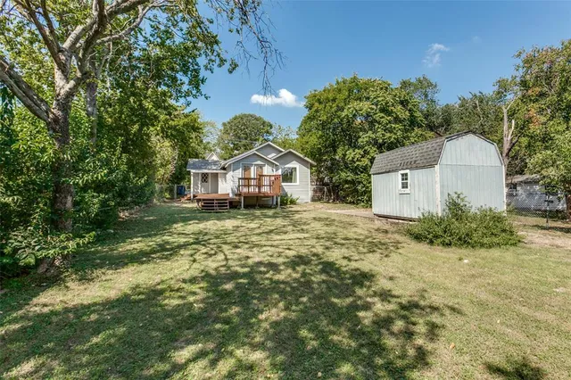 a house view with a garden space