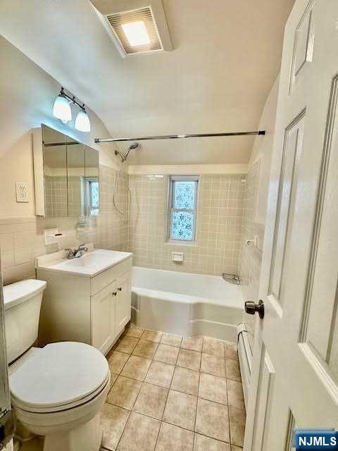 3 MacArthur Avenue Hasbrouck Heights, NJ 07604 - Photo 5 of 15 a bathroom with a sink toilet and shower