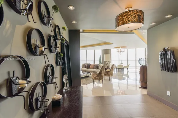 a view of living room and dining room with furniture