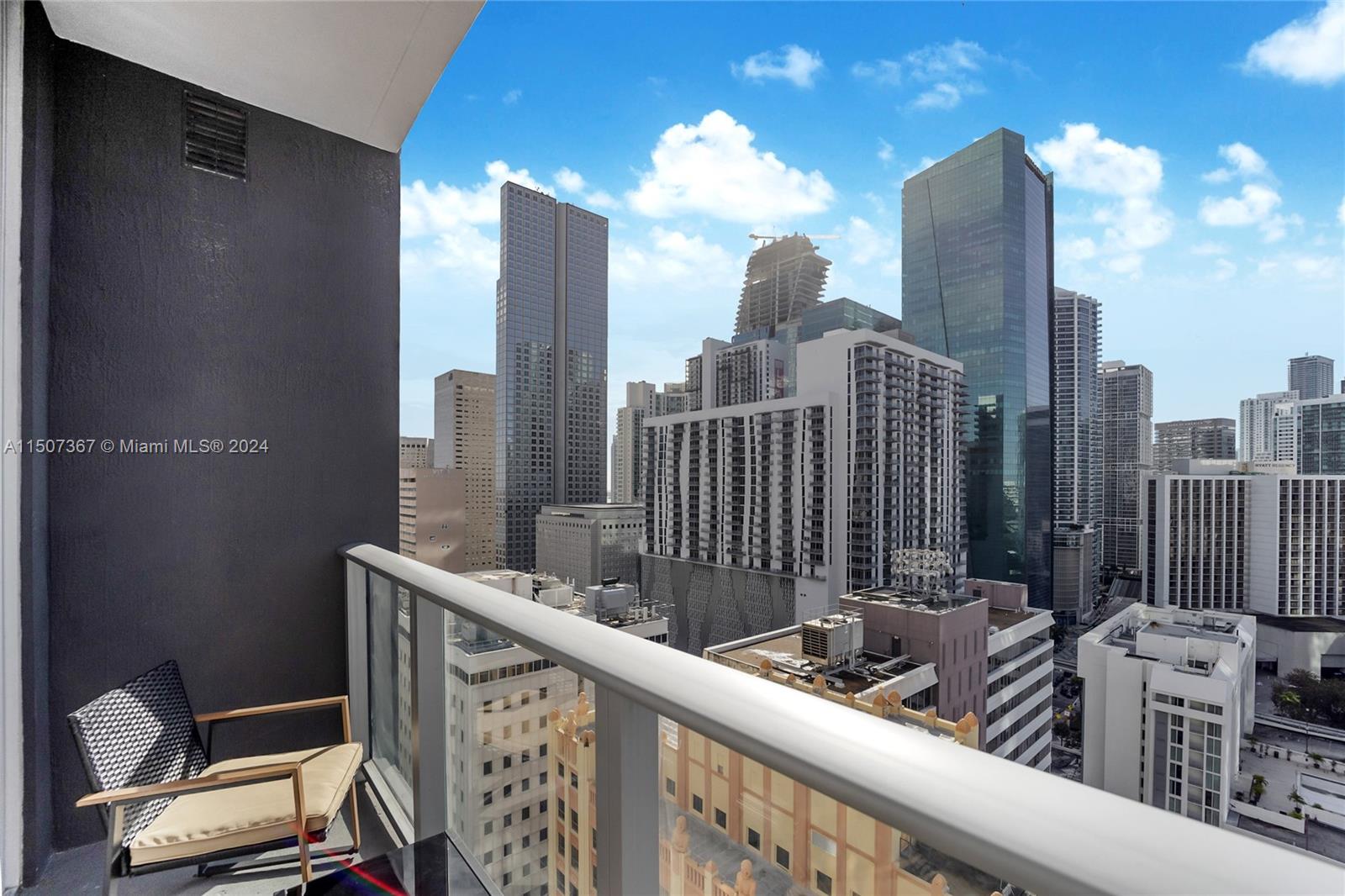 151 Southeast 1st Street, Unit 2109 Miami, FL 33131 - Photo 4 of 13 a view of balcony with furniture