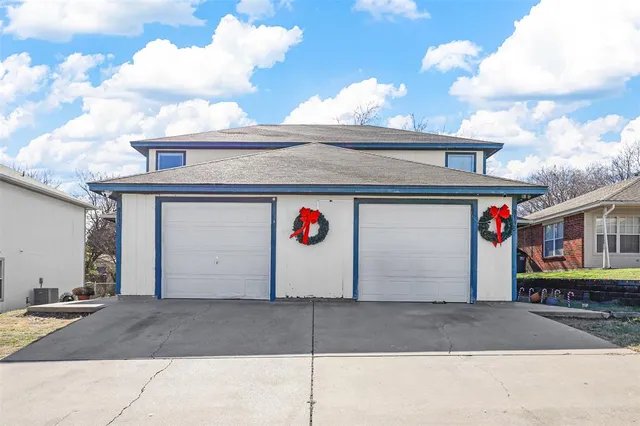 a view of parking space with a street