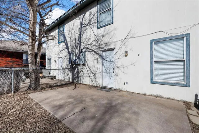 a view of empty room with large trees