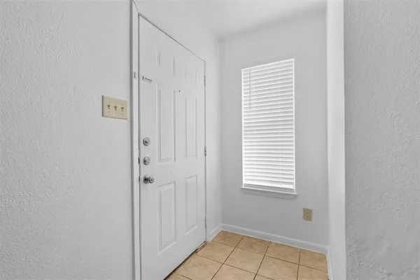 a view of a room that has a window in it