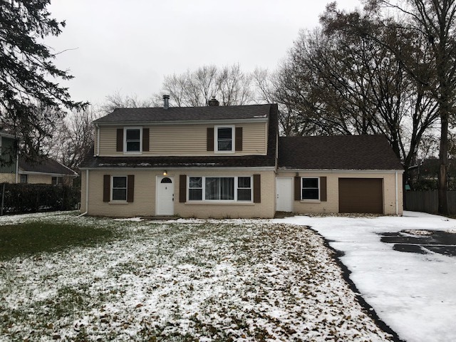 40 Valley Road Glen Ellyn, IL 60137 - Photo 2 of 24 a front view of a house with a yard