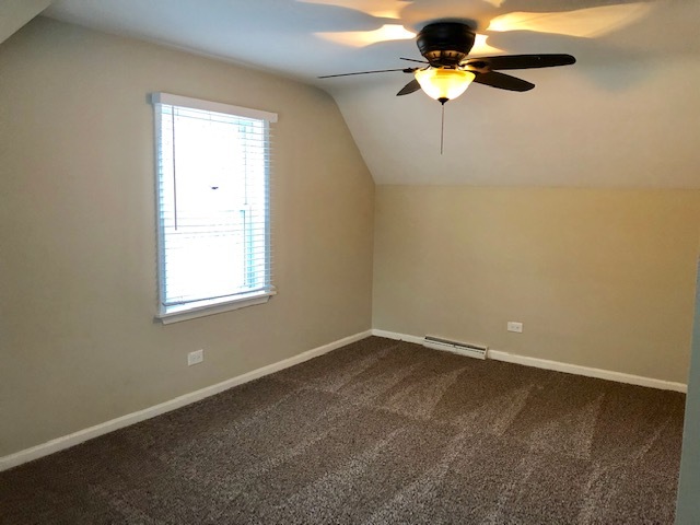 40 Valley Road Glen Ellyn, IL 60137 - Photo 18 of 24 a view of room with a ceiling fan and window